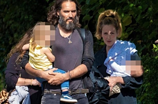 Russell Brand with his wife and two kids