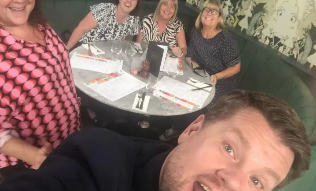 James Corden takes a selfie with restaurant goers