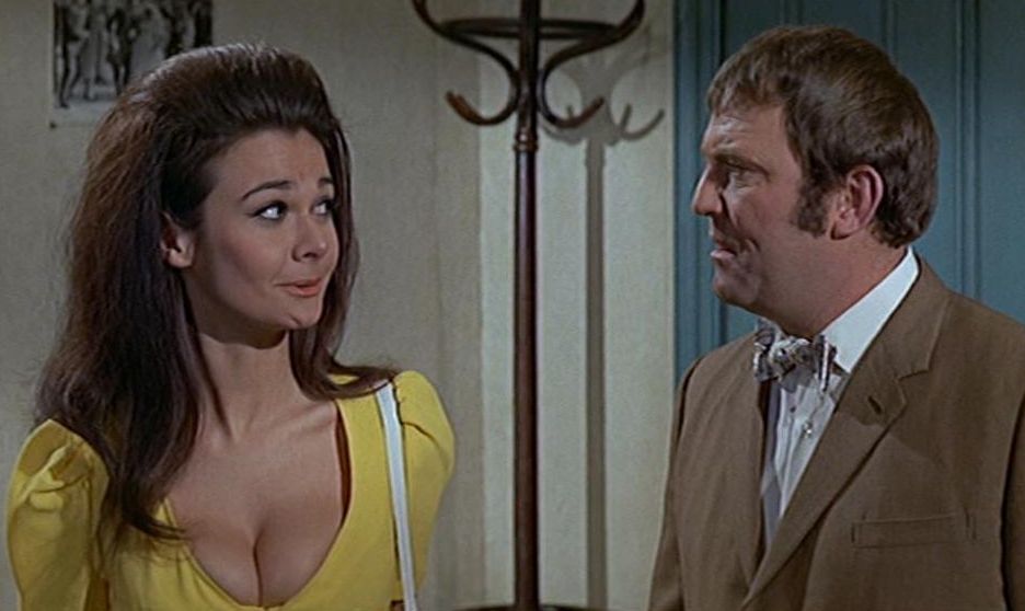 Imogen Hassall known as the countess of clevage in Carry On Loving (1970) alongside Terry Scott